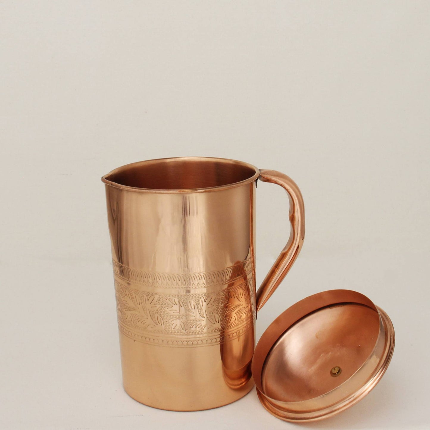 ArtEngraved_Copper_Pitcher_Angle2.jpg