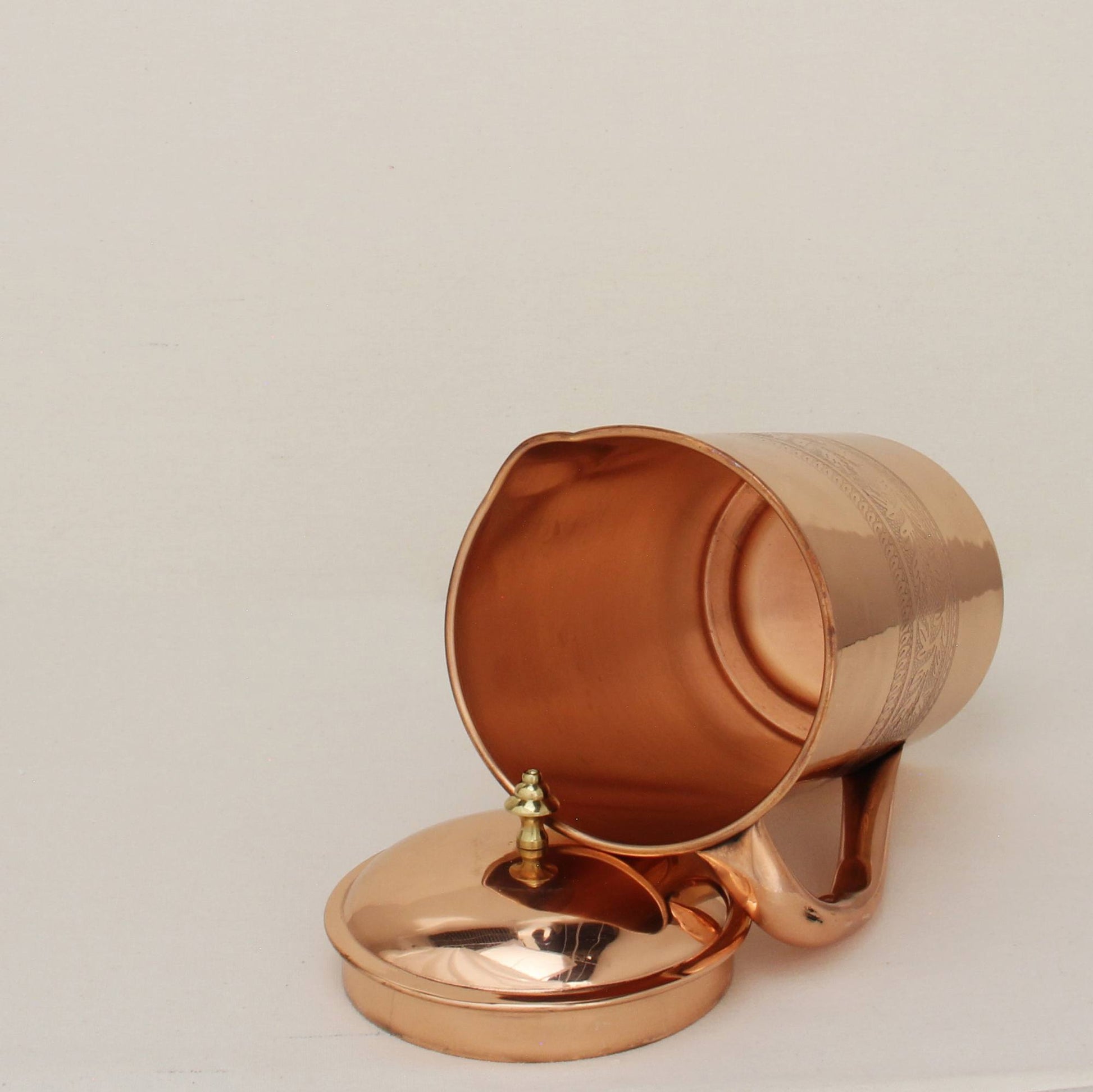 ArtEngraved_Copper_Pitcher_Angle3.jpg
